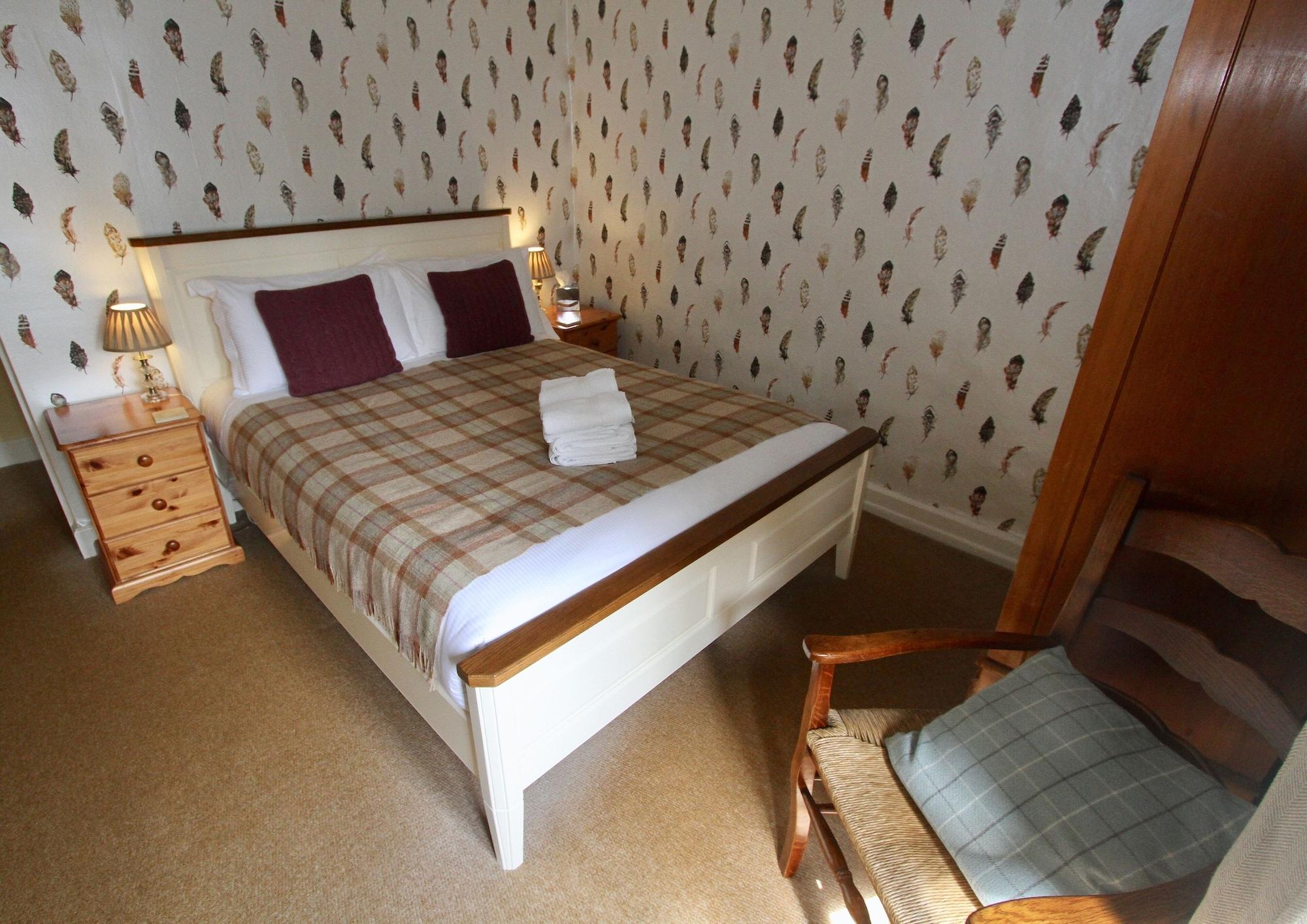 格拉辛顿 艾斯菲尔德庄园旅馆酒店 外观 照片 A bedroom at the hotel
