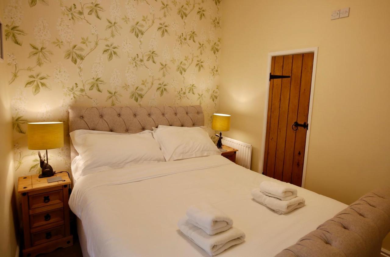 格拉辛顿 艾斯菲尔德庄园旅馆酒店 客房 照片 A bedroom at the Old Post Office